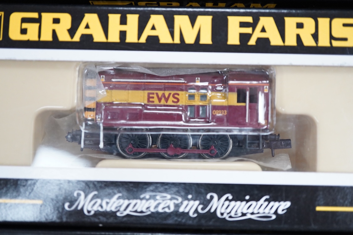 Four boxed Graham Farish N gauge railway Class 08 0-6-0 diesel locomotives; a BR, D4019 (1005), a Railfreight Distribution, 08 653 (371-000), an EWS, 08933 (371-002) and a Thomas 1, 08500 (1006).
